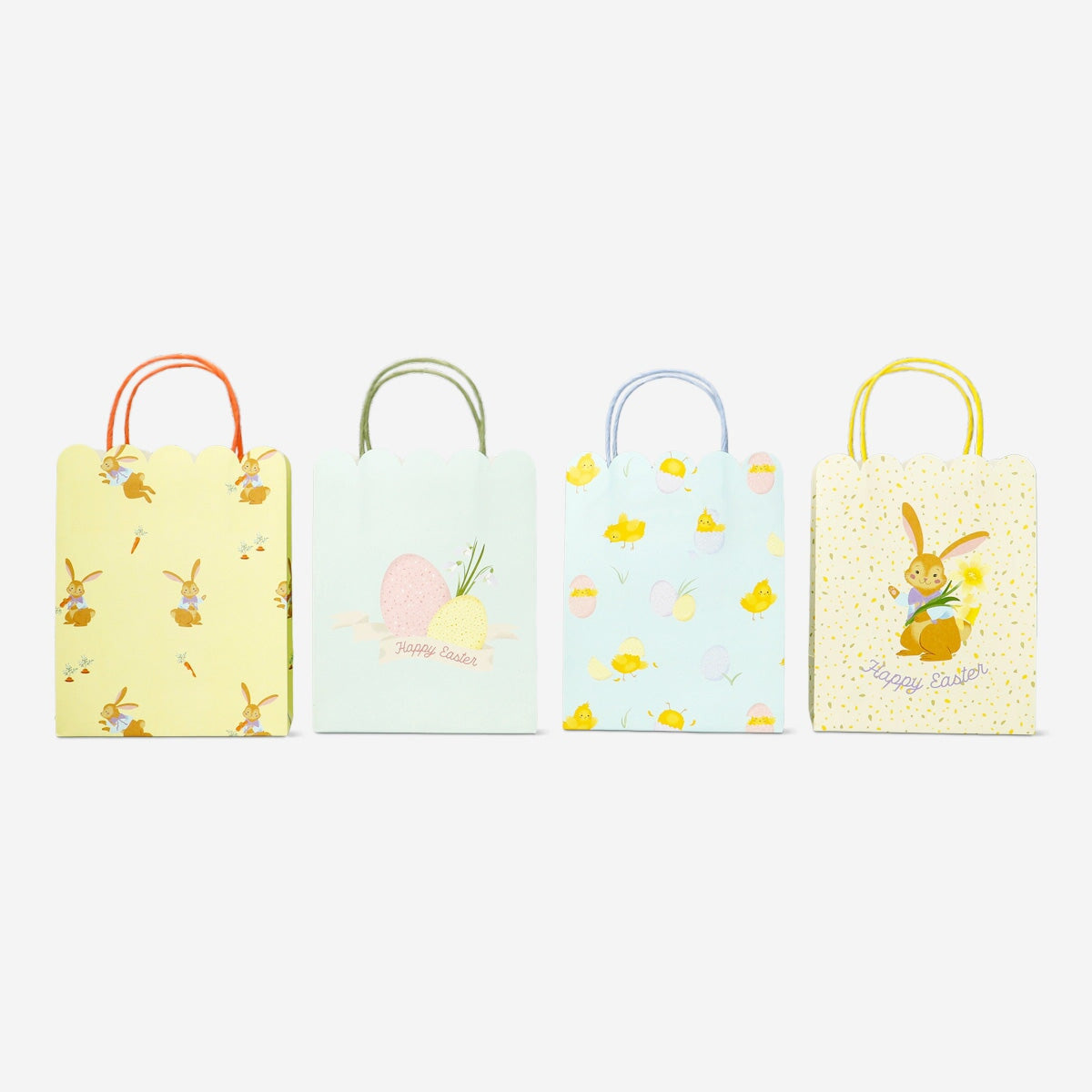 Four colorful Flying Tiger Copenhagen party gift bags with festive designs, perfect for gift wrapping and celebrations.