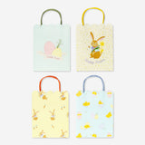 Four colorful Flying Tiger Copenhagen party gift bags with playful designs, perfect for celebrations and gift-giving.