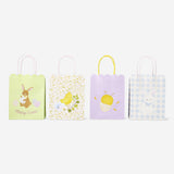 Four Flying Tiger Copenhagen party gift bags with scalloped edges, perfect for celebrations and gift presentation.