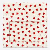 Party gift box for photos with red hearts from Flying Tiger Copenhagen, featuring decorative packaging for celebrations.