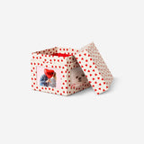 Party gift box for photos with red hearts from Flying Tiger Copenhagen, featuring festive design and decorative heart accents.