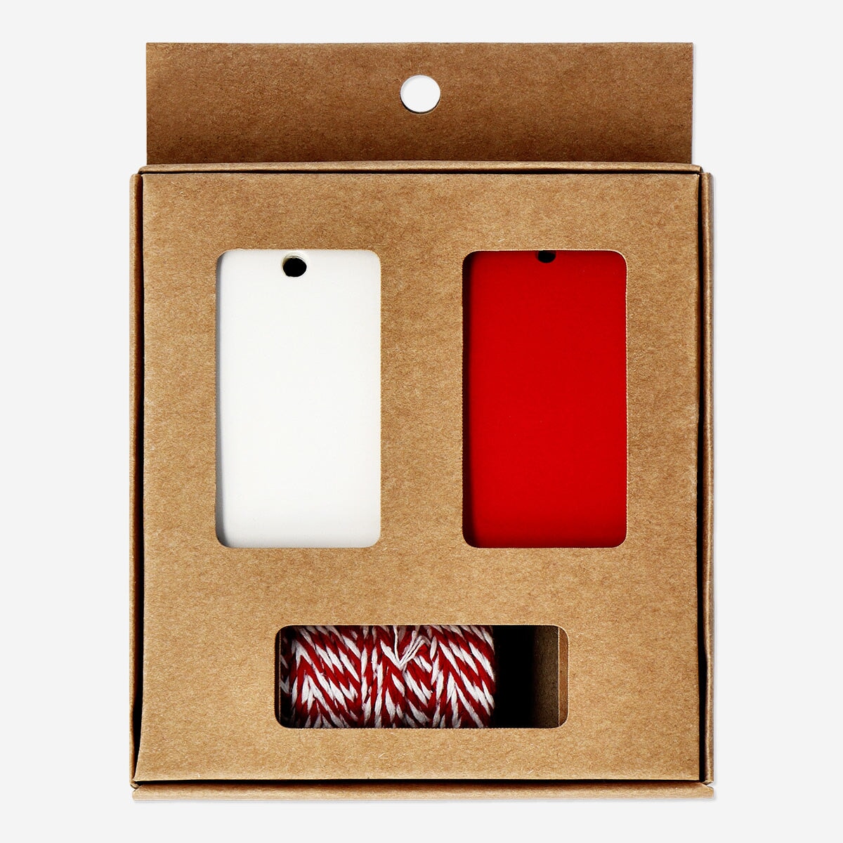 Party gift decoration set with red ribbon and gift tags from Flying Tiger Copenhagen, perfect for festive gift wrapping.
