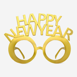 Gold New Year party glasses by Flying Tiger Copenhagen, festive party accessories with shiny metallic finish and playful design.