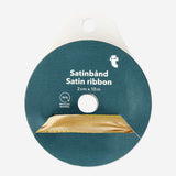 Gold satin ribbon from Flying Tiger Copenhagen, 10 meters long, ideal for party decorations and crafting projects.