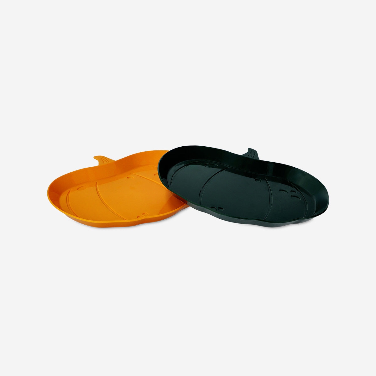Two reusable pumpkin-shaped party plates from Flying Tiger Copenhagen, designed for festive gatherings and seasonal celebrations.