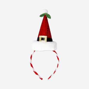 Small Santa hat hairband for adults, festive party accessory by Flying Tiger Copenhagen with a red and white design.