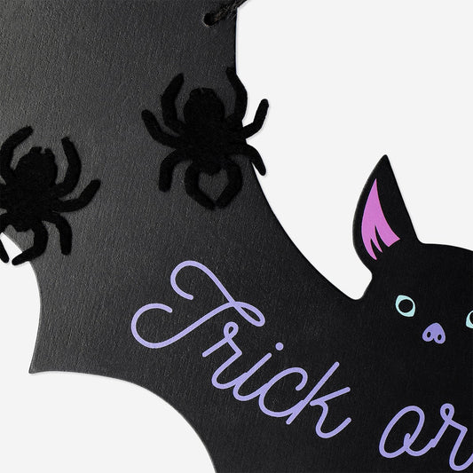 Cartello per porta Dolcetto o scherzetto con pipistrello