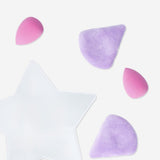 Set of 8 Flying Tiger Copenhagen blender sponges and makeup pads in bauble design, perfect for applying and blending makeup.