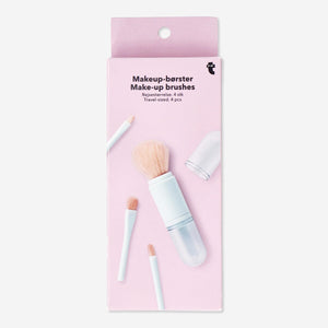 Four-piece multi-coloured travel make-up brushes set by Flying Tiger Copenhagen, featuring various brush types for personal care.
