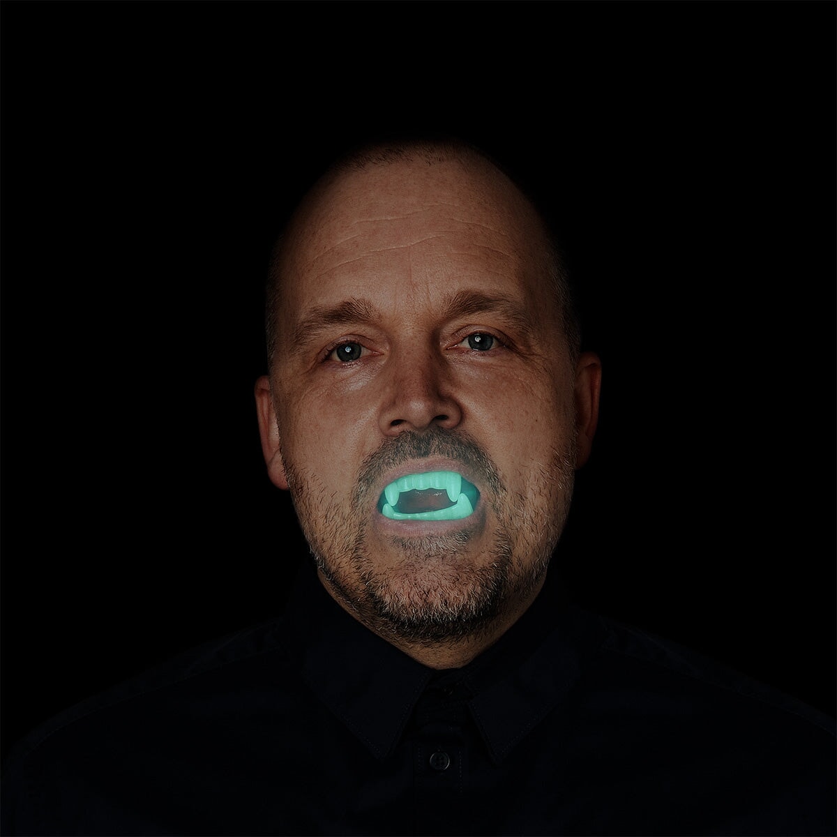 Glow in the dark vampire fangs from Flying Tiger Copenhagen, one-size personal care accessory with realistic fang design.
