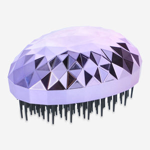Holographic diamond-shaped detangler hairbrush by Flying Tiger Copenhagen for easy, gentle hair detangling.