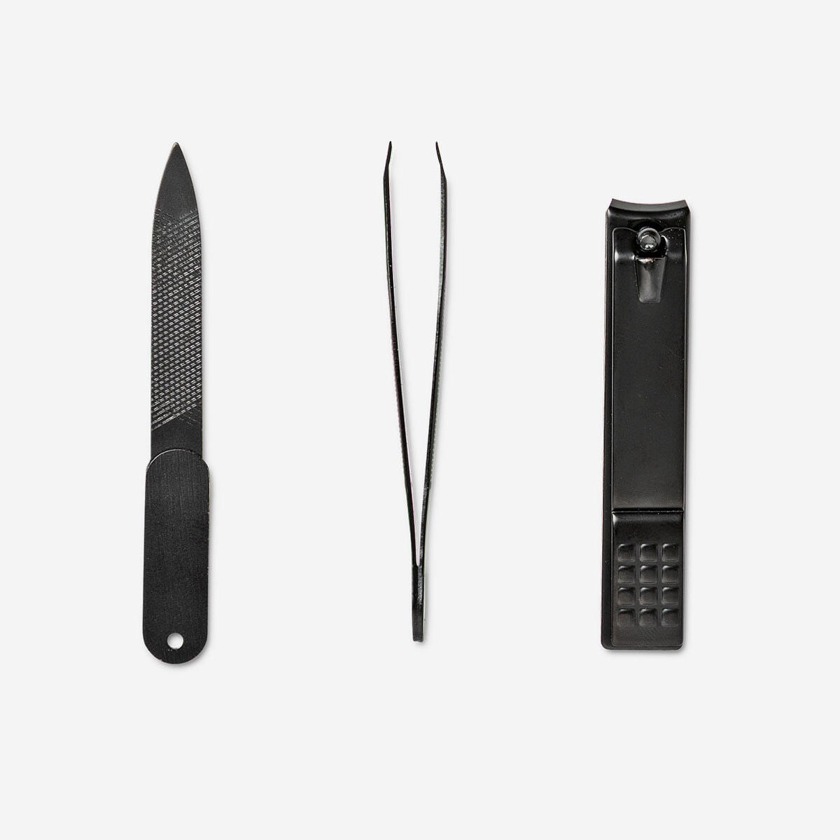 Flying Tiger Copenhagen 3-piece manicure set in a compact toolbox, includes nail clippers, scissors, and tweezers for personal care.