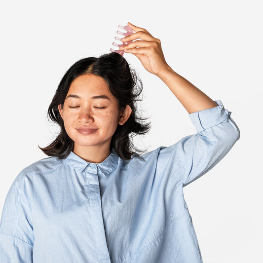 Strumento gua sha rosa per il massaggio del cuoio capelluto