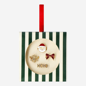 Set of four adjustable Christmas-themed rings in a gift box from Flying Tiger Copenhagen, perfect for festive personal care accessories.