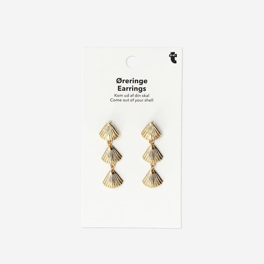 Boucles d'oreilles coquillages sur une rangée