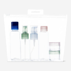 Flying Tiger Copenhagen 6-piece travel personal care set with toiletries in compact bottles and containers, ideal for trips.