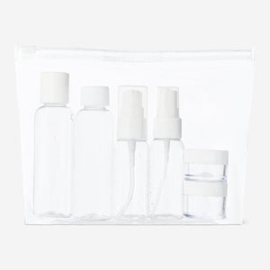 Flying Tiger Copenhagen 6-piece travel personal care set with bottles and containers for on-the-go use.