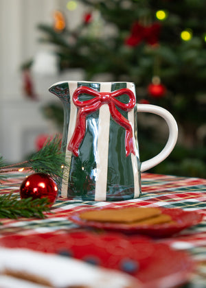 1L striped ceramic jug with embossed bow design, part of a kitchen set by Flying Tiger Copenhagen.