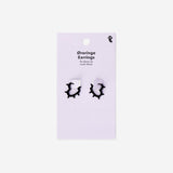 Black hearts textile earrings with a playful design from Flying Tiger Copenhagen, featuring soft fabric and heart-shaped accents.