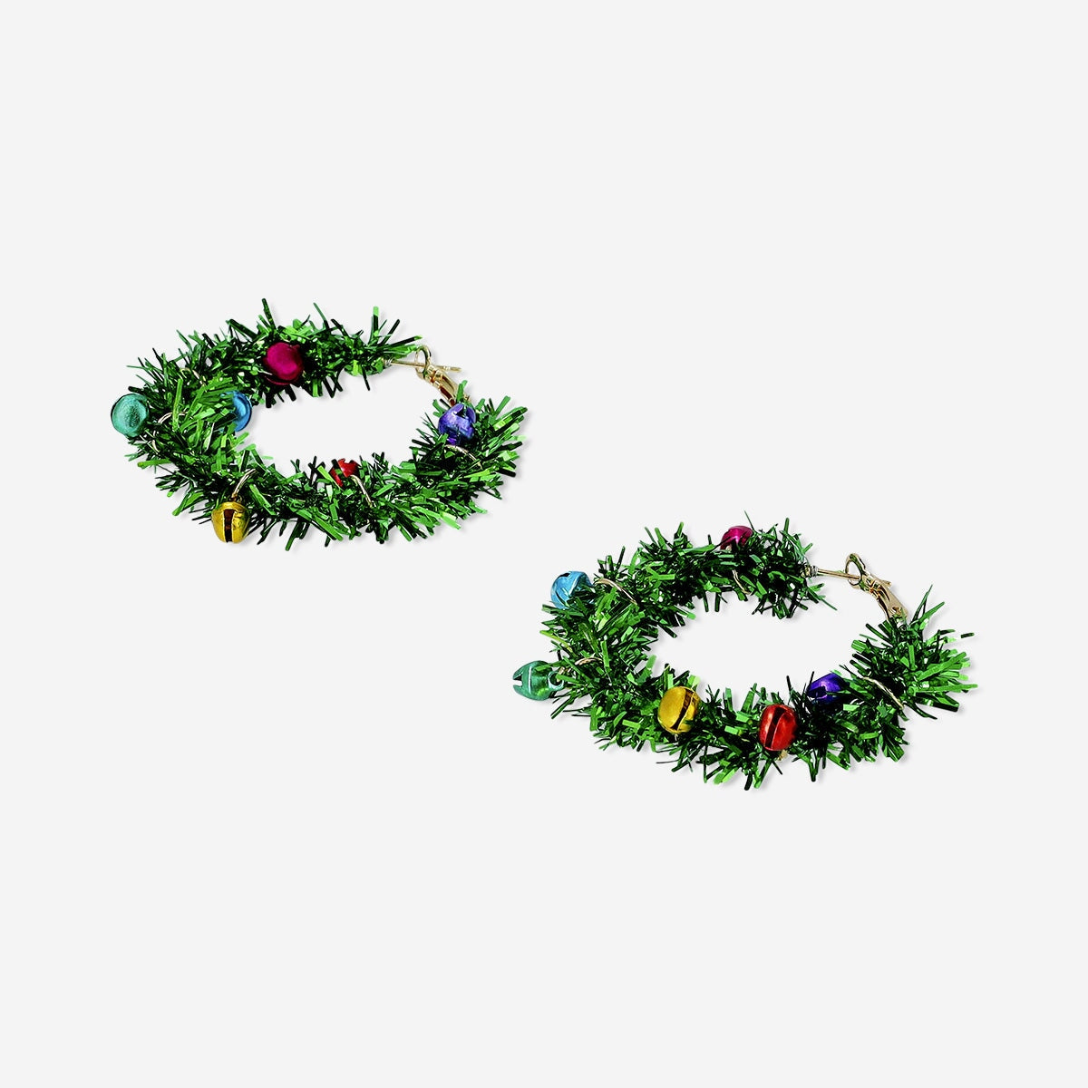 Green tinsel hoop Christmas earrings made of textile by Flying Tiger Copenhagen, featuring festive holiday design.