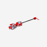 Folding textile umbrella with apple design by Flying Tiger Copenhagen, featuring colorful apple illustrations on the canopy.