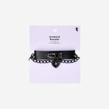 Textile Gothic bracelet with dark, intricate design by Flying Tiger Copenhagen, featuring detailed fabric and Gothic-inspired accents.