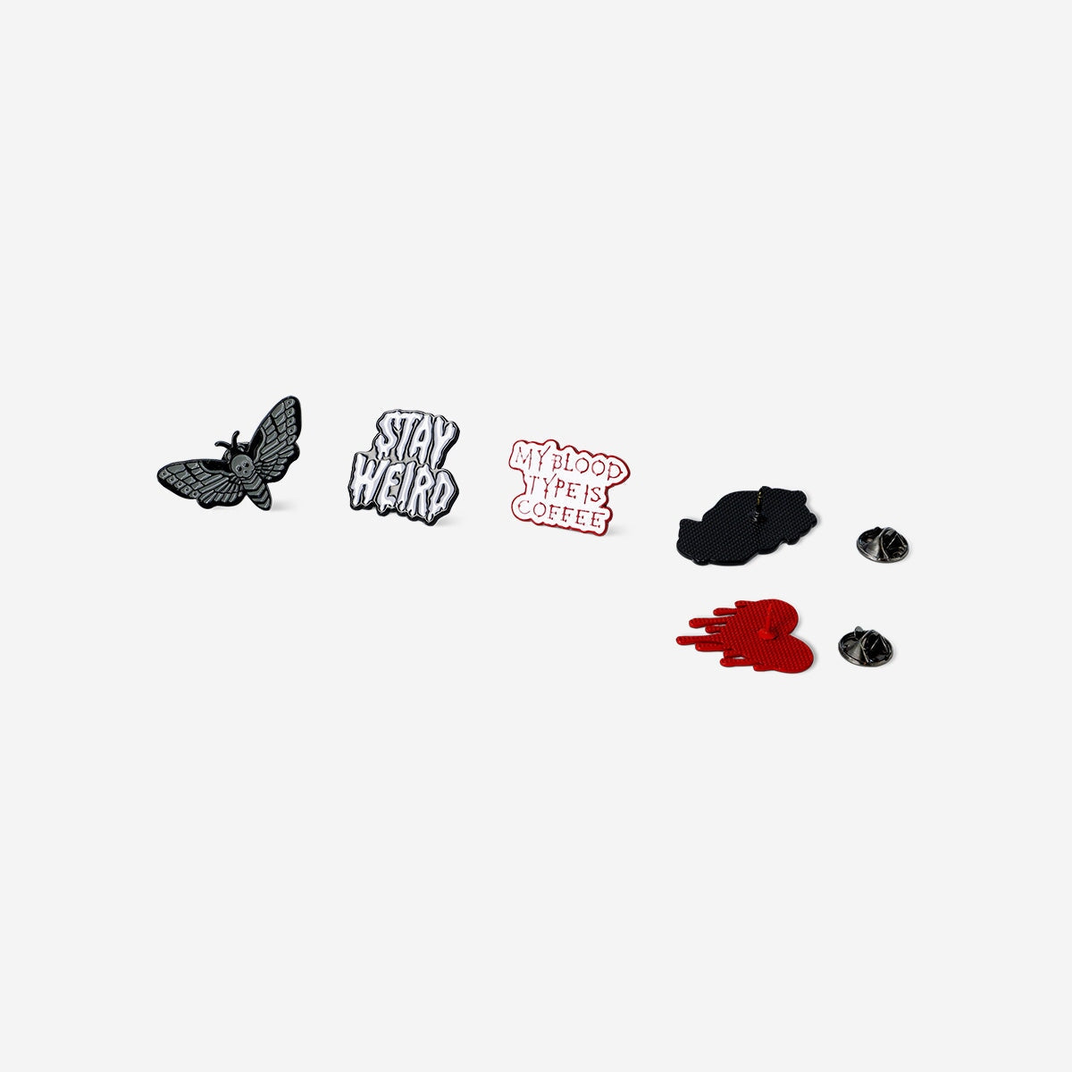 Set of five Gothic clothing pins from Flying Tiger Copenhagen, textile accessories with dark, gothic-themed designs.