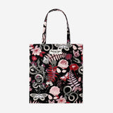 Gothic flowers textile tote bag with black and dark floral design, featuring sturdy handles and a spacious interior for everyday use.
