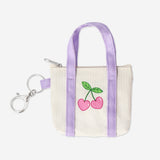 Flying Tiger Copenhagen textile key ring shaped like a mini bag, featuring colorful fabric design and metal keyring attachment.