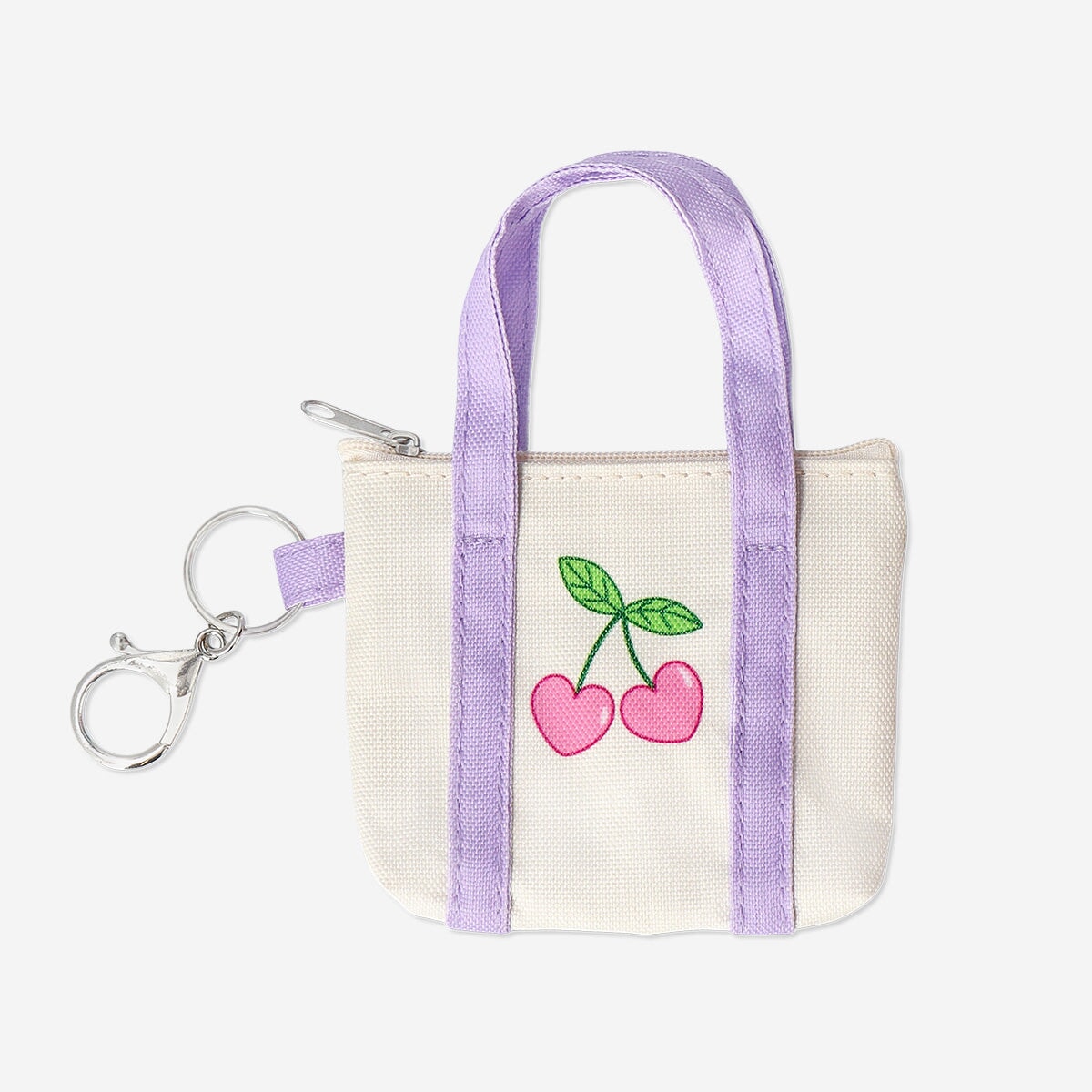 Flying Tiger Copenhagen textile key ring shaped like a mini bag, featuring colorful fabric design and metal keyring attachment.