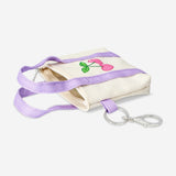 Flying Tiger Copenhagen textile key ring featuring a mini bag design, with colorful fabric details and a metal keyring attachment.