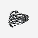Textile skeleton hair clip by Flying Tiger Copenhagen featuring a spooky skeleton design on a fabric clip.