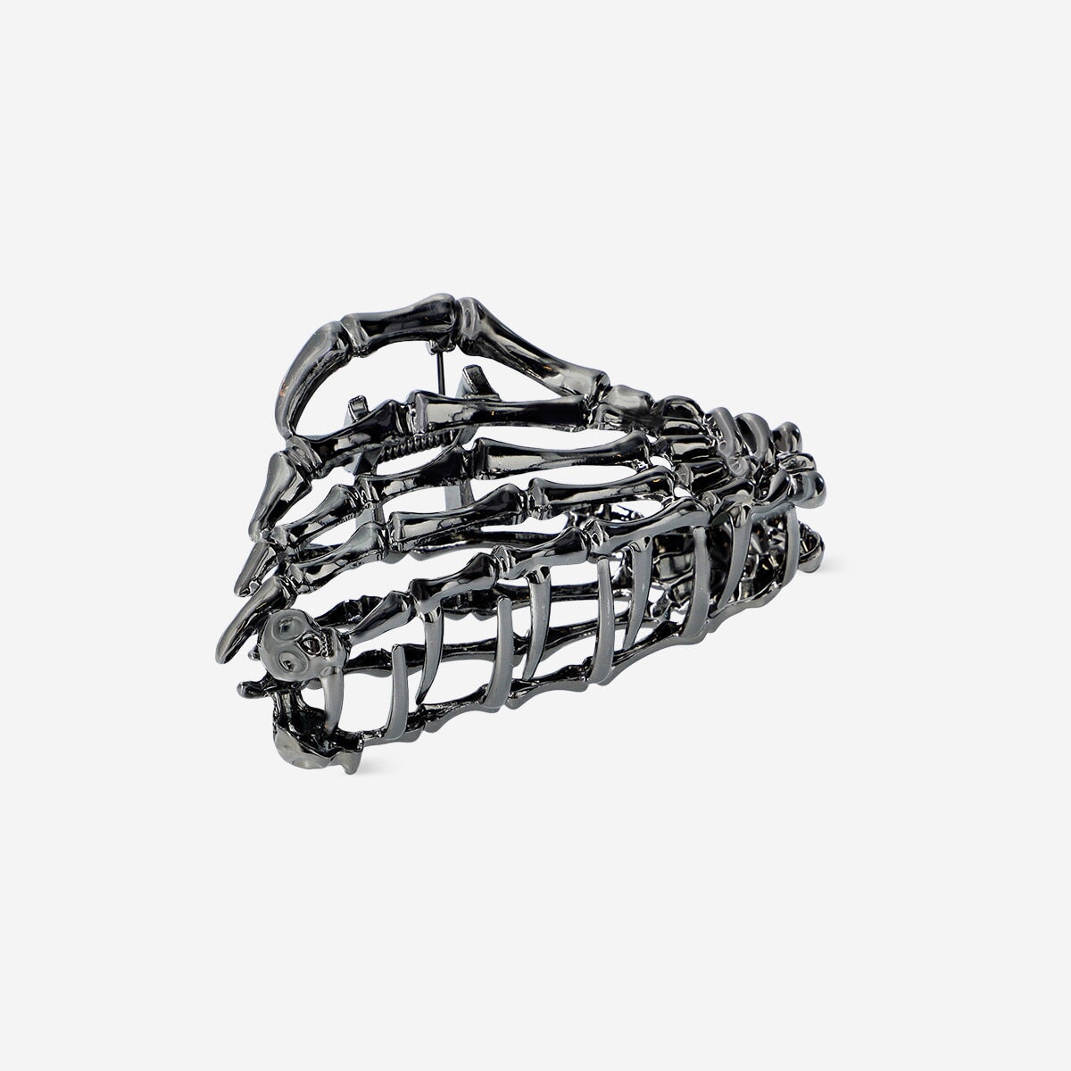 Textile skeleton hair clip by Flying Tiger Copenhagen featuring a spooky skeleton design on a fabric clip.