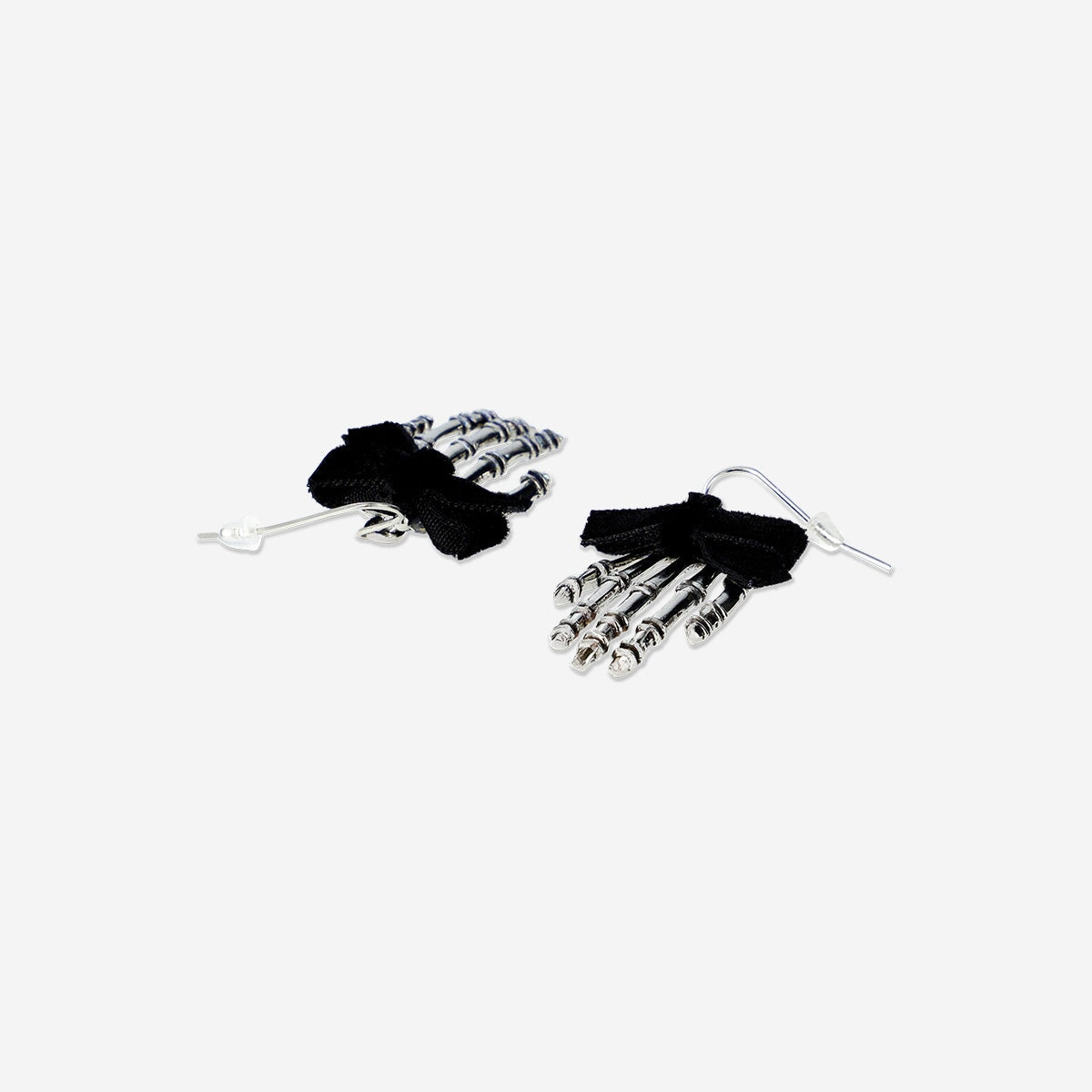 Textile skeleton hands earrings featuring detailed skeletal design, from Flying Tiger Copenhagen.