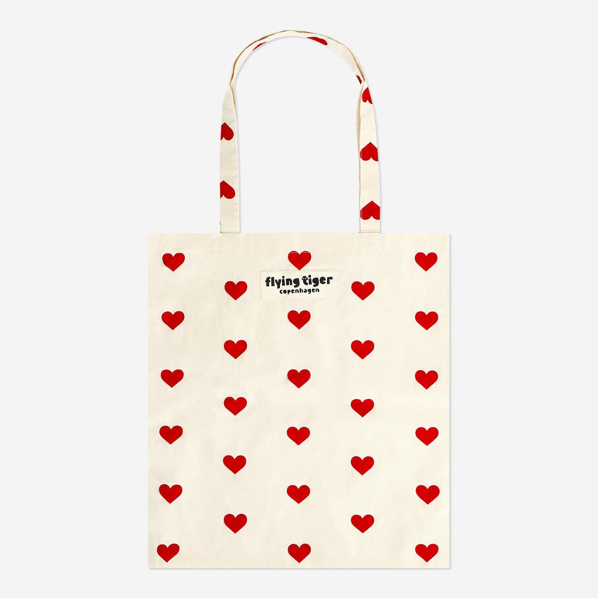 Flying Tiger Copenhagen textile tote bag with red heart pattern, durable fabric and spacious design for everyday use.