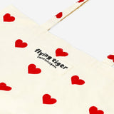 Flying Tiger Copenhagen textile tote bag with red heart patterns, casual and stylish for everyday use.