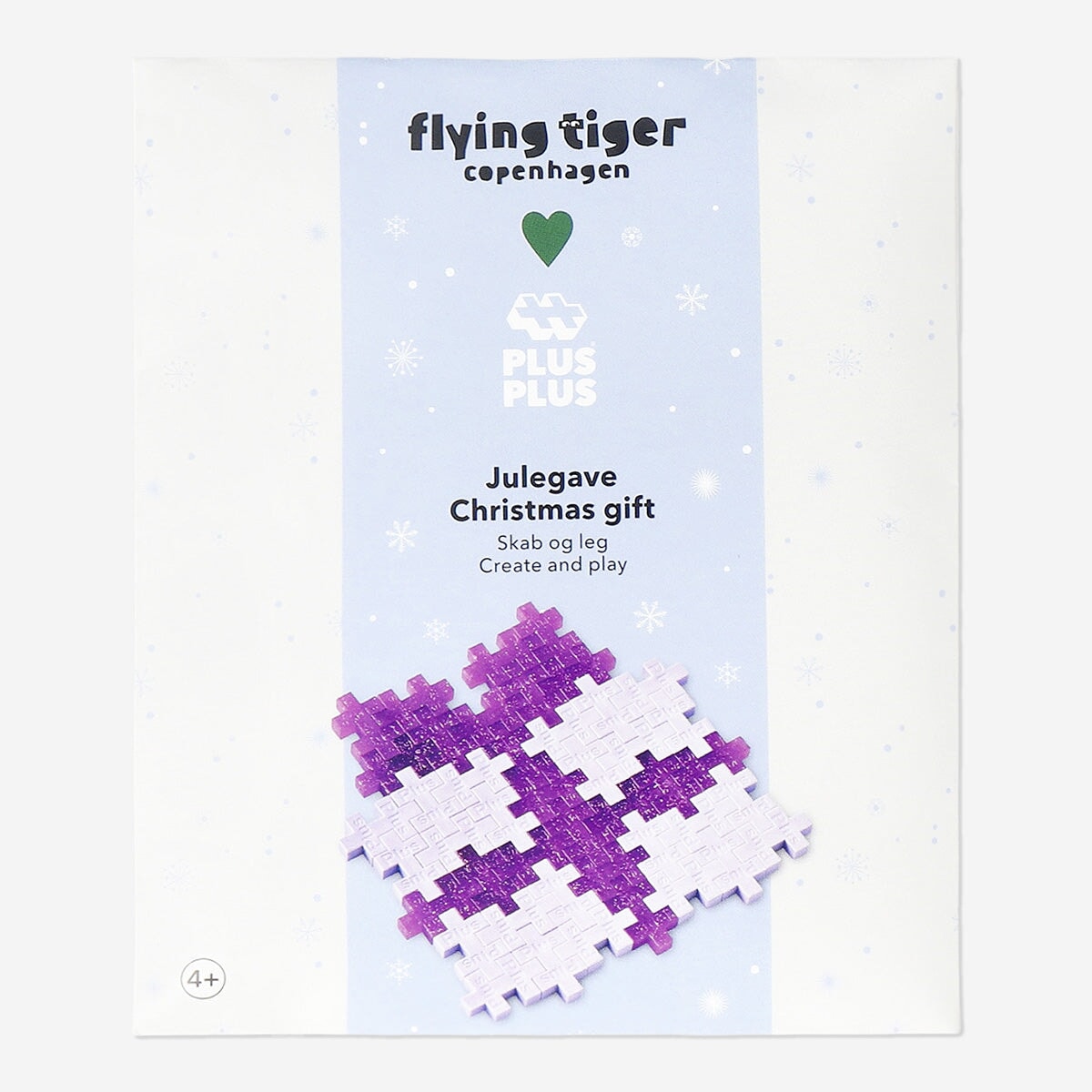 Colorful Plus Plus building toy in a Christmas present box by Flying Tiger Copenhagen, perfect for creative holiday play.