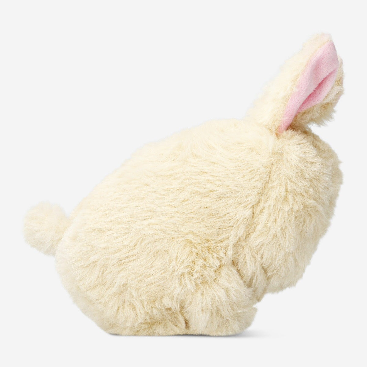 Flying Tiger Copenhagen cuddly toy dog with a wagging tail, soft plush texture, and friendly appearance.