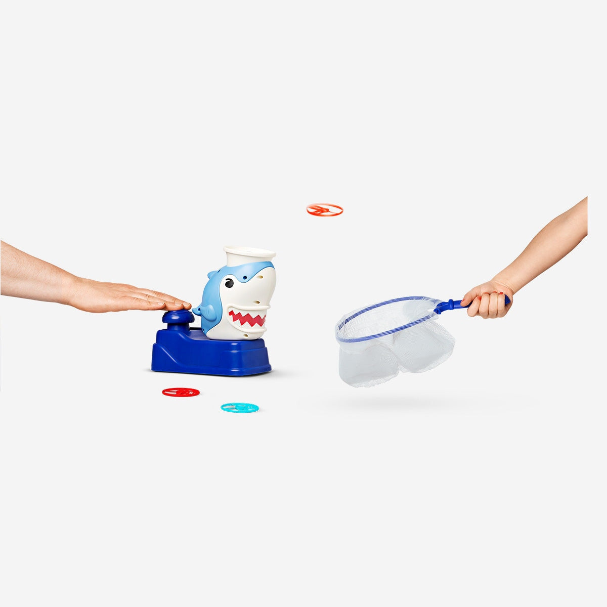 Flying Tiger Copenhagen disc-shooting shark toy with a colorful shark figure ready to launch discs.