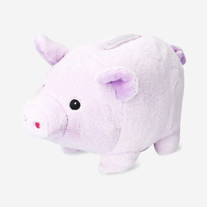 Soft plush piggy bank toy from Flying Tiger Copenhagen featuring a cute pig design and a coin slot on its back.