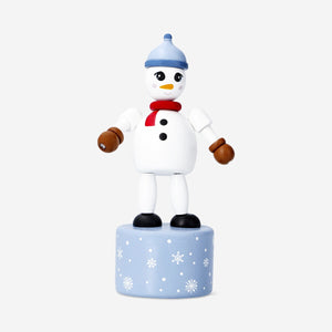 Colorful snowman push me toy from Flying Tiger Copenhagen, featuring a cheerful winter design and soft, squeezable body.