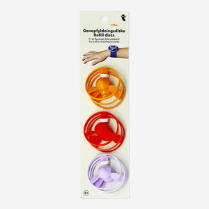 Set of 9 refill discs for a Flying Tiger Copenhagen disc-flying bracelet toy, shown in a close-up image.
