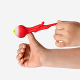 Two Shooting Eyes toys from Flying Tiger Copenhagen, colorful plastic toy with eyes that pop out when pressed.