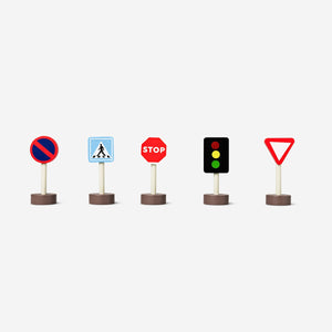Set of five toy traffic signs from Flying Tiger Copenhagen, colorful plastic signs for children’s play and learning.
