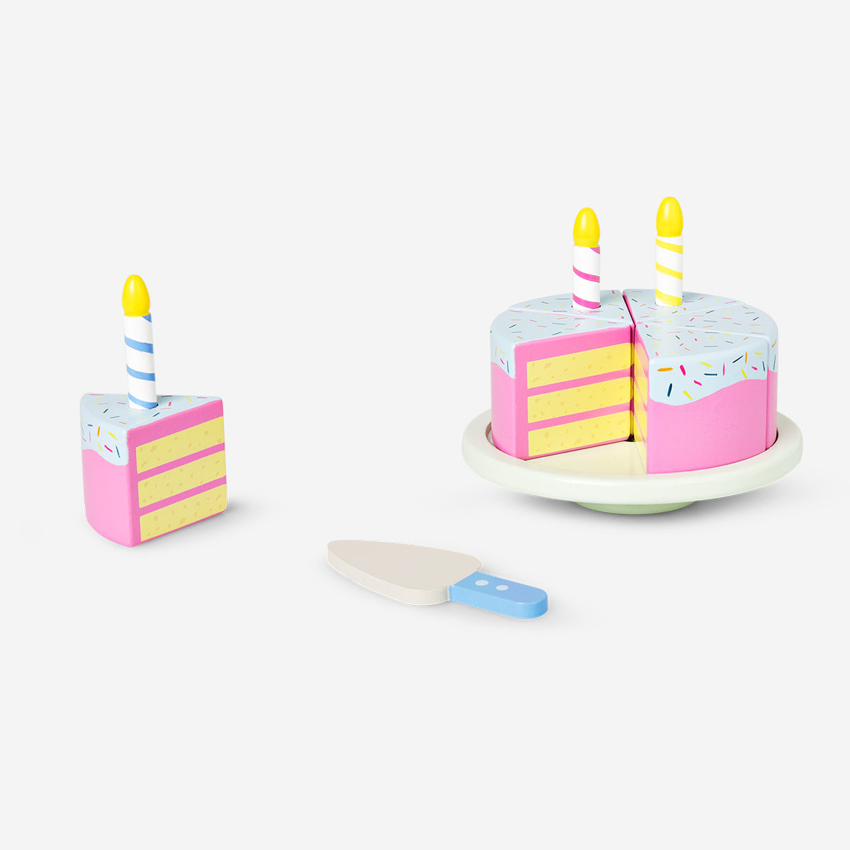 Wooden birthday play cake toy by Flying Tiger Copenhagen with colorful, layered cake pieces and playful design.