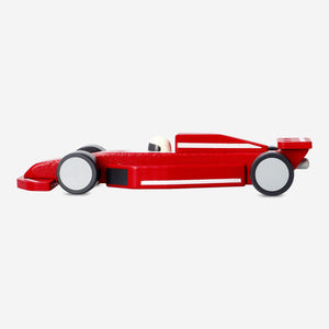 Wooden red racing car toy from Flying Tiger Copenhagen with sleek design and smooth finish, perfect for play and decoration.