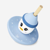 Wooden spinning top toy featuring a snowman design by Flying Tiger Copenhagen, crafted from natural wood with colorful accents.