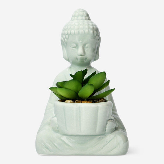 Green decorative Buddha with artificial plant