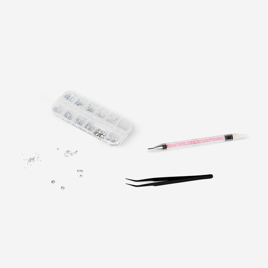 Nail decorating kit with rhinestones and applicator