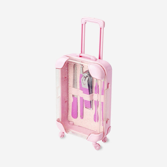 Pink manicure and pedicure set in suitcase